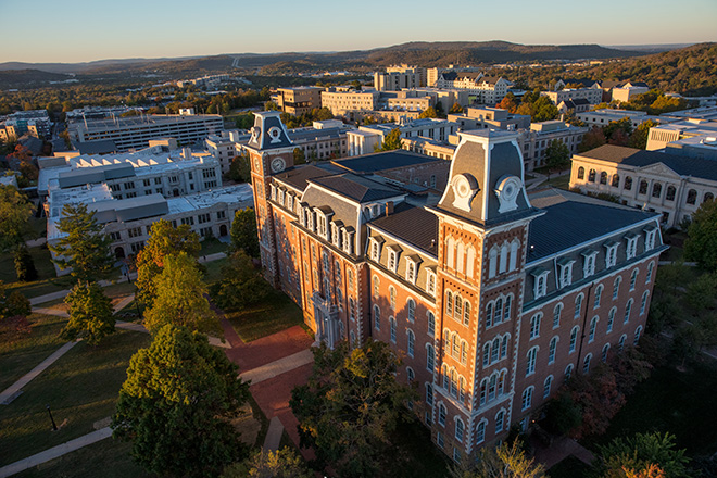 Aerial photo of Old Main during sunrise.